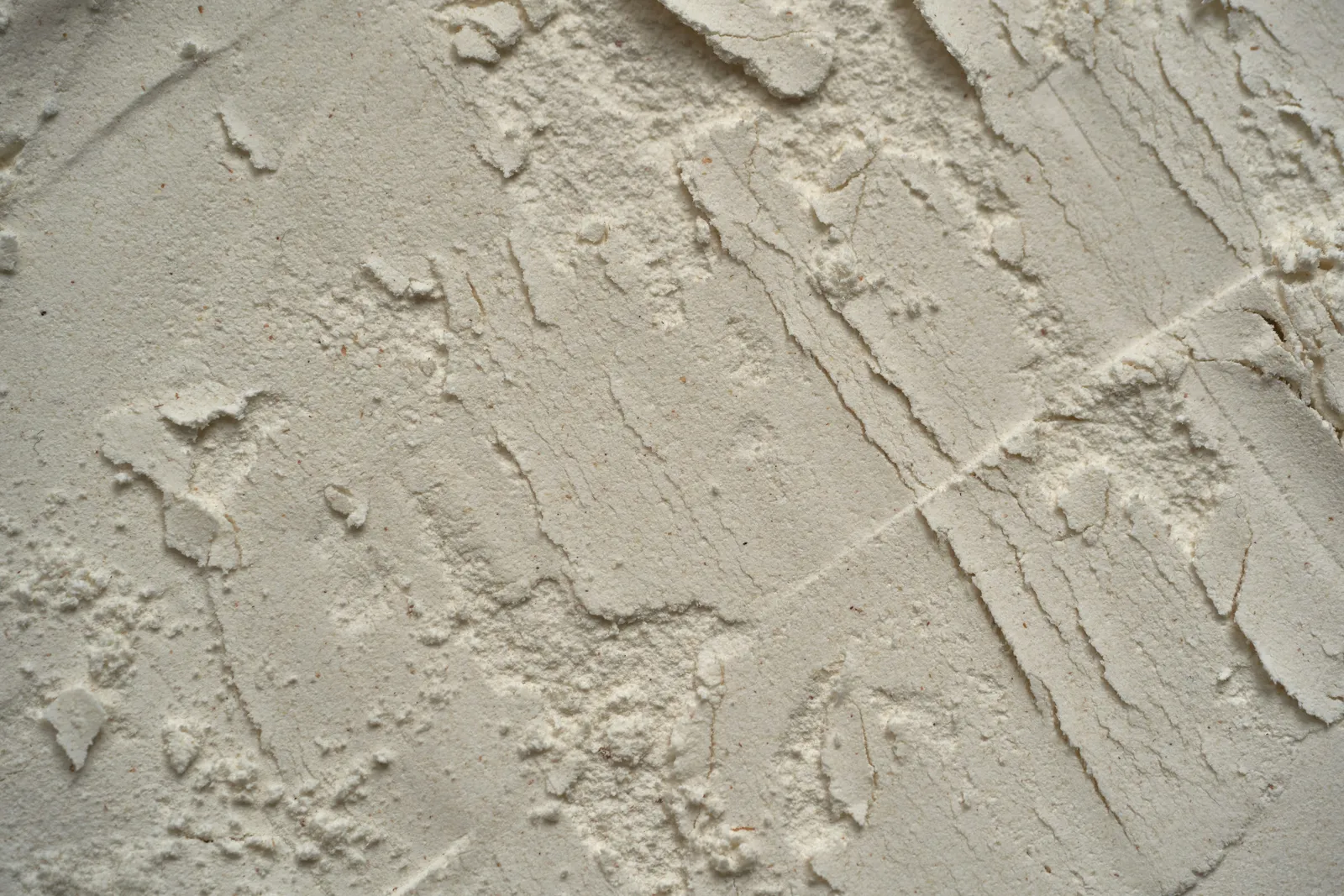Hand troweled hard coat plaster surface, close up